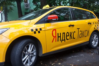 Yellow Yandex taxi. Moscow. September, 13,2016 clipart