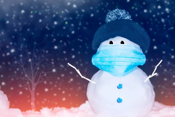 Snowman with face protection mask. Winter landscape. Merry christmas and happy new year greeting card