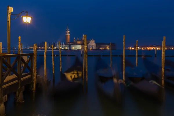 Traditional gondolas with the bell tower of the Saint Giorgio Maggiore Church — Stock Photo, Image