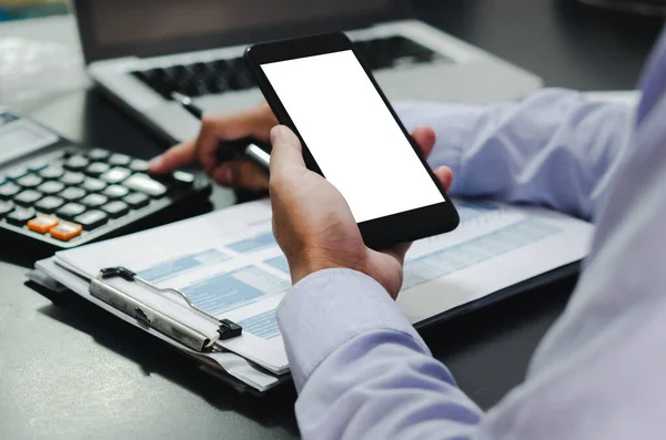 businessman hand holding a mobile phone with a mock-up screen Use space to put ads or images. concept technology business