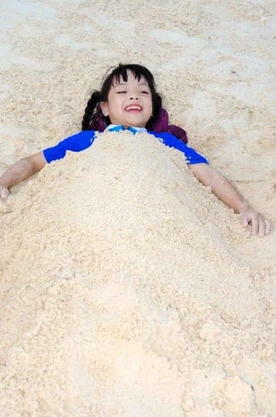 Young  lying in the sand — Stock Photo, Image