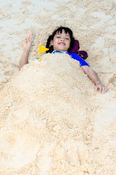 Young  lying in the sand — Stock Photo, Image