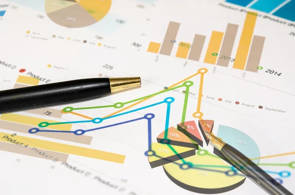 Graphs and pen — Stock Photo, Image