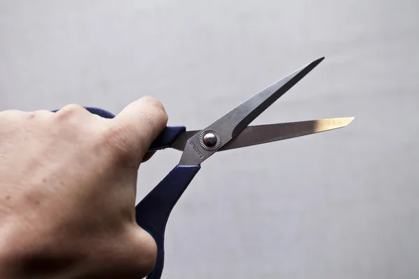 Nůžky v ruce — Stock fotografie