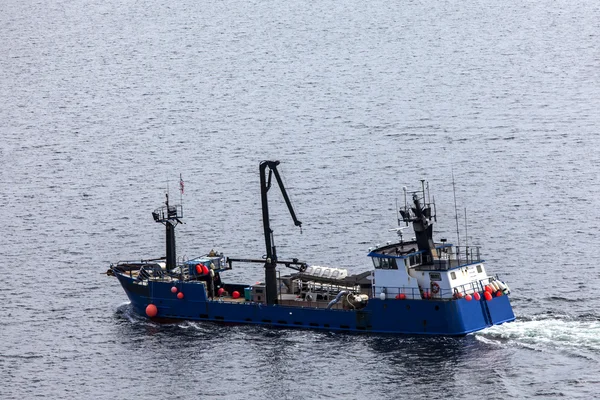 Salmon fishing boat setting out — Stock Photo, Image