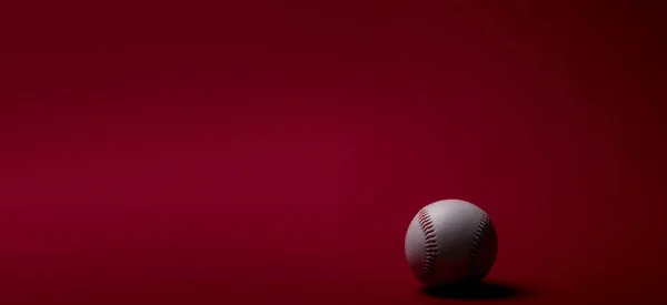 Baseball ball on red background. Team sport concept