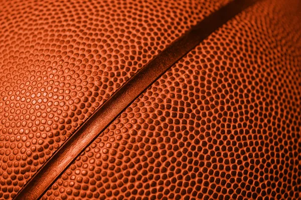 バスケットボールボールの質感の背景の詳細を閉じます オレンジ色のフィルター バナーアートのコンセプト チームスポーツ — ストック写真