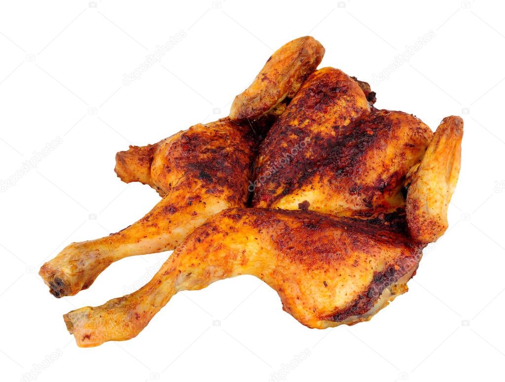 Roasted spatchcock chicken with piri piri seasoning isolated on a white background