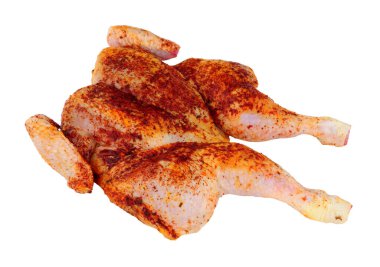 Raw spatchcock chicken with piri piri seasoning isolated on a white background clipart
