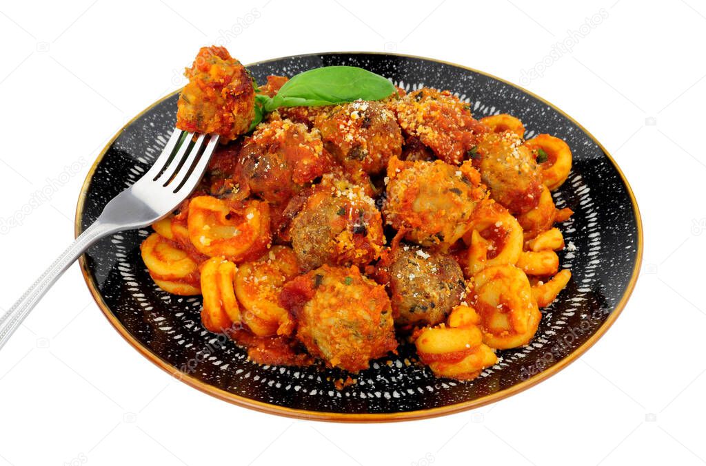 Beef and pork meatballs Al Forno with trulli pasta in tomato sauce meal isolated on a white background