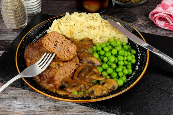 Salisbury Steak Meal Mashed Potato Peas Mushroom Sauce — Stock Photo, Image