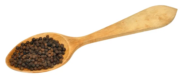 Zwarte peper en houten lepel — Stockfoto