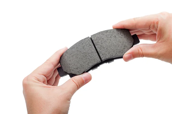 Brake pads in hand. — Stock Photo, Image
