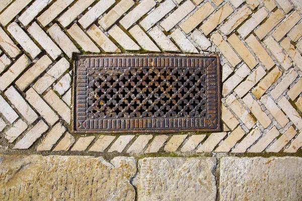 Iron Rusty Rectangular Manhole Shaped Holes Lid Sidewalk Paved Stone — Stock Photo, Image