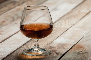 Cognac glass on a wooden table