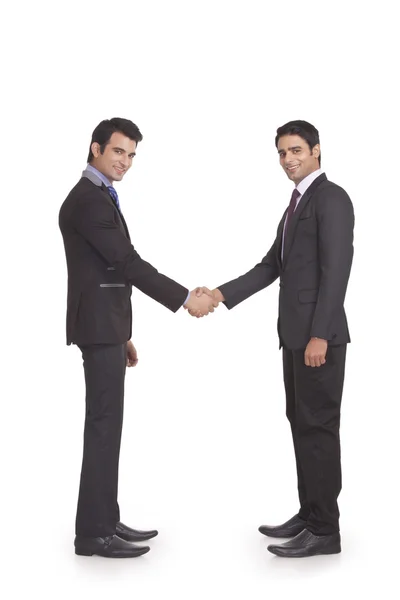 Businessmen shaking hands — Stock Photo, Image