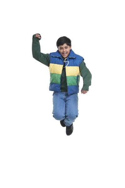 Boy jumping in the air — Stock Photo, Image