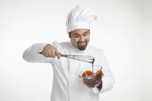 Chef mixing chocolate — Stock Photo, Image