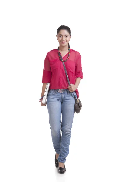 Young indian student walking — Stock Photo, Image