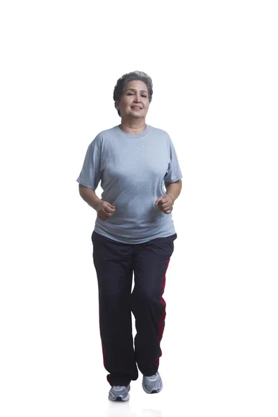 Old woman exercising — Stock Photo, Image