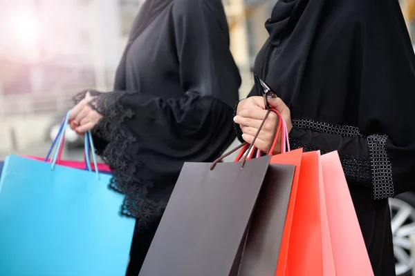 Emarati Arab women coming out of shopping