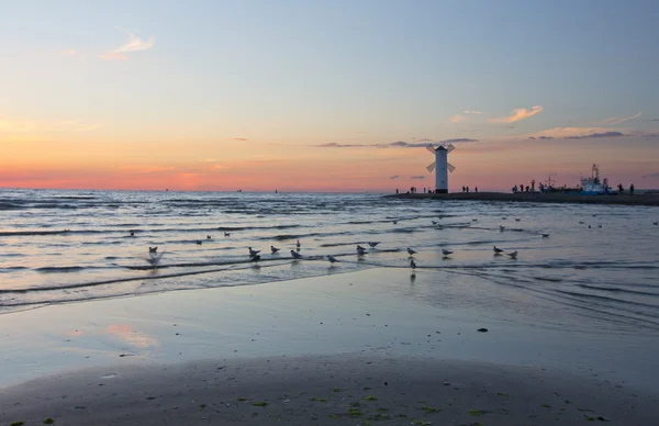 Fyren väderkvarn Stawa Mlyny, Swinoujscie, Polen Stockbild