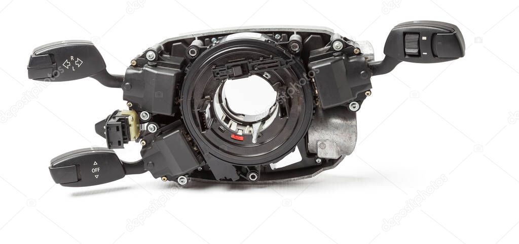 Steering wheel understeering switches for windshield wipers and turn signals with steering angle sensor disassembled on a white isolated background, spare part for car repair or for sale at junk yard.