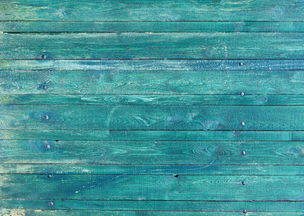 Wooden tabletop painted in blue.