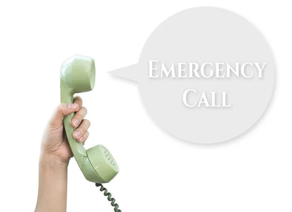 Llamada de emergencia. Sujetar teléfono vintage aislado en blanco ba — Foto de Stock
