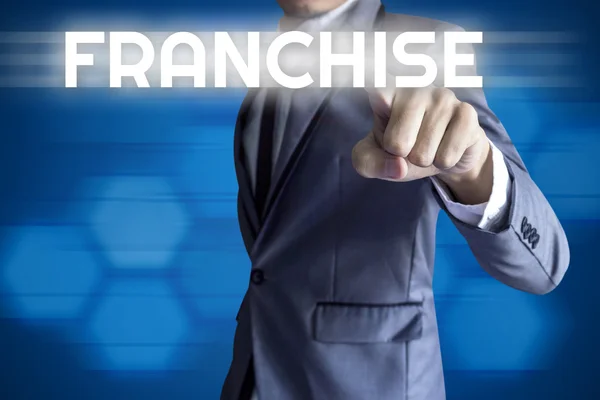 Business man touch interfaccia moderna per il concetto di franchising su blu — Foto Stock