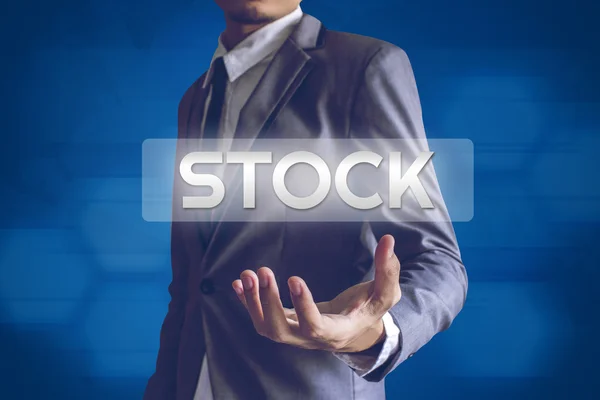 Businessman atau Salaryman dengan teks STOCK modern interface concep — Stok Foto