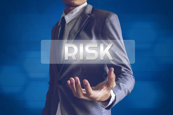 Businessman or Salaryman with Risk text modern interface concept — Stock Photo, Image