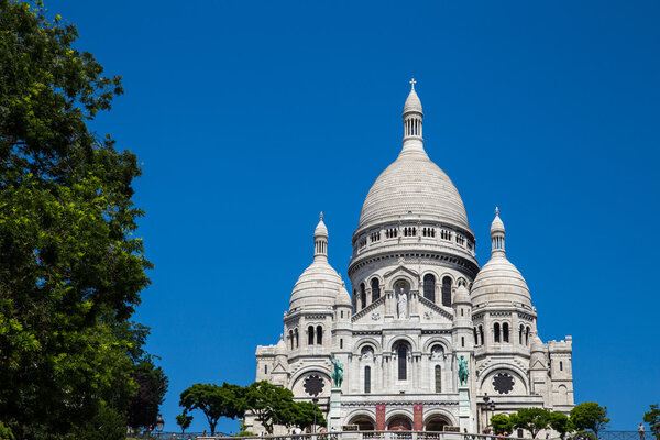 View of Basilica of the Sacred Heart of Paris with cloudy sky in