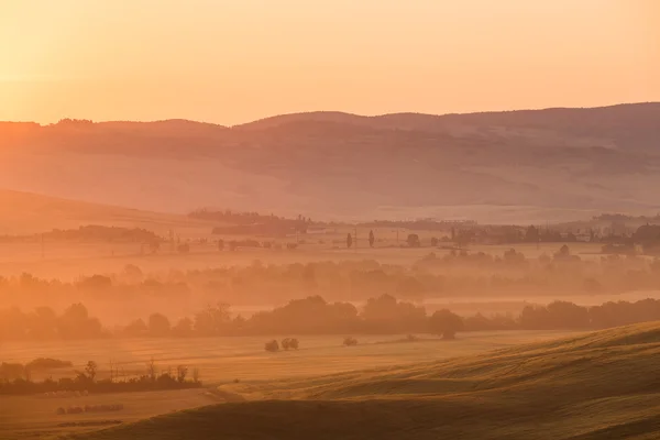 Early morning on countryside, San Quirico d Orcia, Tuscany, Italy — Stock Photo, Image