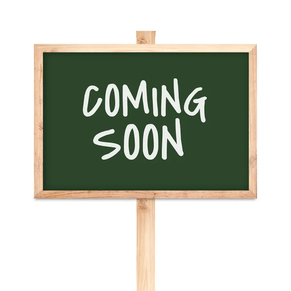 Coming soon op blackboard hout label geïsoleerd op een witte pagina — Stockfoto