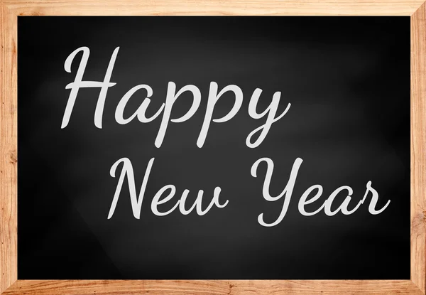 Happy New Year text on chalkboard. — Stock Photo, Image