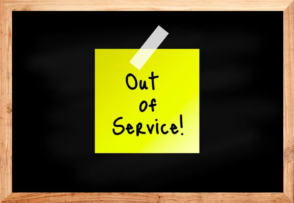 Out of service on wood blackboard in black color — Stock Photo, Image