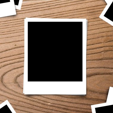 blank photo frame on brown wood old background texture