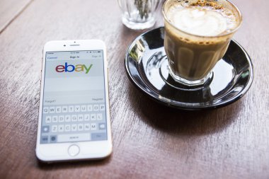 CHIANG MAI, THAILAND - APRIL 22, 2015: Close up of ebay app on a Apple iPhone 6 screen. ebay is one of the largest online auction and shopping websites.