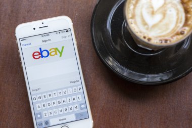 CHIANG MAI, THAILAND - APRIL 22, 2015: Close up of ebay app on a Apple iPhone 6 screen. ebay is one of the largest online auction and shopping websites.