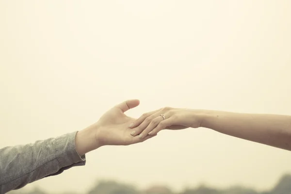 Couple hand together touch with love vintage filter tone. — 스톡 사진