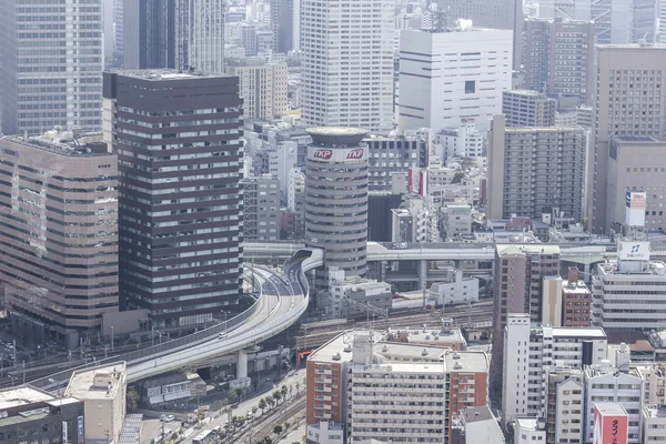 Osaka, Japonya - 09 Şubat 2015 - city Osaka, Kansai bölgesinde ve Osaka ili, Japonya'nın ikinci büyük metropol olduğunu. Şehir Osaka ile birçok gökdelenler çok modern bir. — Stok fotoğraf