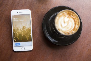 CHIANG MAI, THAILAND - APRIL 22, 2015: Log in page Twitter application using Apple iPhone 6 in coffee shop. Twitter is largest and most popular social networking site in the world.
