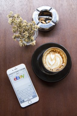 CHIANG MAI, THAILAND - APRIL 22, 2015: Close up of ebay app on a Apple iPhone 6 screen. ebay is one of the largest online auction and shopping websites.