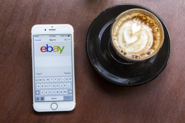 CHIANG MAI, THAILAND - APRIL 22, 2015: Close up of ebay app on a Apple iPhone 6 screen. ebay is one of the largest online auction and shopping websites.