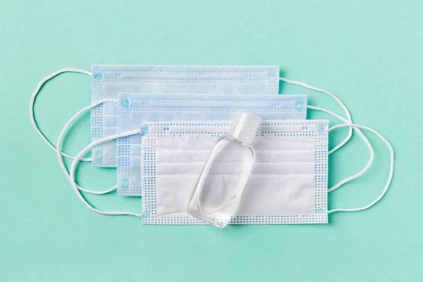Disinfecting Hand Sanitizer Small Bottle Disposable Medical Face Masks Pale — Stock Photo, Image
