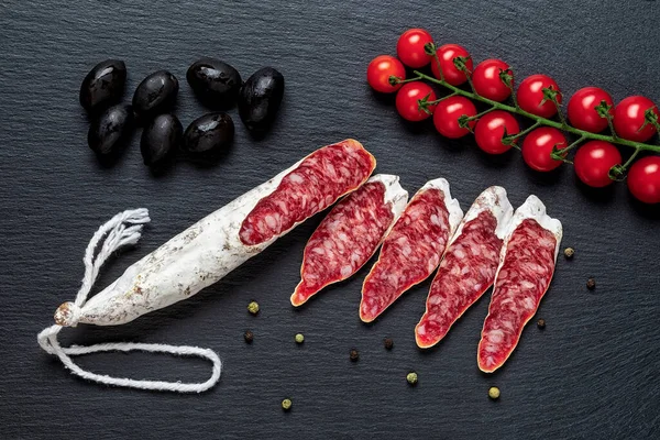 Slices Fuet Catalan Thin Sausage Black Olives Cherry Tomatoes Vine — Stock Photo, Image