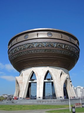 Kazan, Republic of Tatarstan, Russia - AUGUST 22, 2014: Wedding Palace in the form of the cauldron. clipart