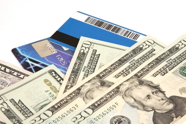 Cartões de crédito e dólares americanos isolados em fundo branco — Fotografia de Stock