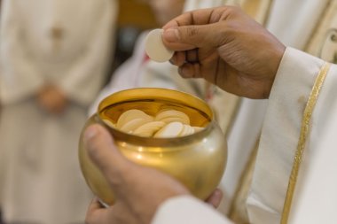The Holy Bread during the Communion clipart